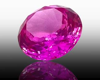 A Large 15mm Round Pink Sapphire
