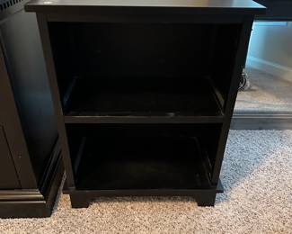 O30 - $30 each. 2 Available. Pier 1 Black Bookcase. Measures 13" deep x  23.5" wide x  30" tall. 