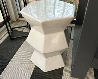 F17 - $95 Each. 2 Available in White. Zigzag ceramic garden stool/ side table. 