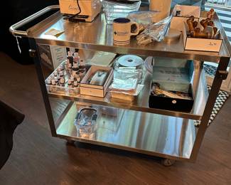 K66 - $250. Stainless Rolling Cart. Used for extra kitchen storage. Very clean! Measures 22” wide x 42” long x 34” tall. 
