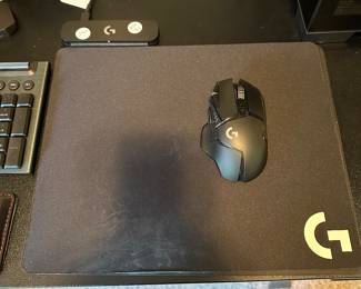 O25 - $100. LogiTech G502 Lightspeed Mouse WITH  Logitech p-r0001 Wireless Charging Mouse. 