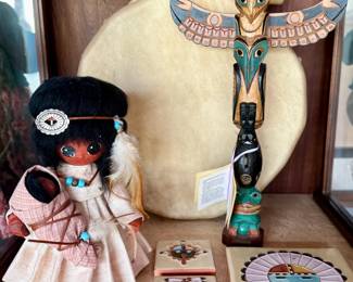Native American drum, dolls, carved totem, art tiles. $10-50