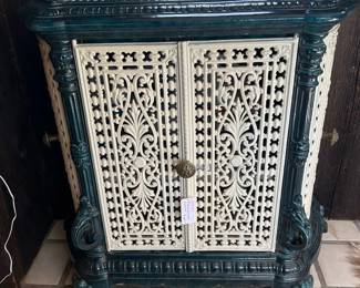 French enamel cabinet (converted stove) $300, Lion figure $50