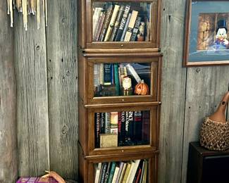 Turn of the century Oak stacking bookcase ($550) and books.