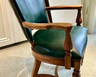 Carved Walnut and leather office chair. $100
