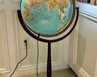 Lighted globe on stand. $100