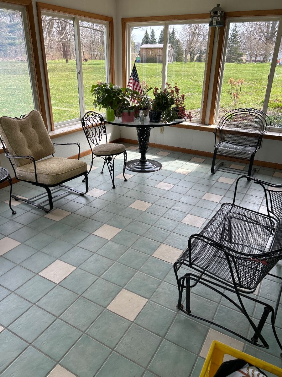 Wrought iron patio furniture 
Large glass top table -4 chairs
Glider
2 round tables and 2 square side tables
2 larger arm  chairs
