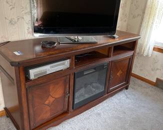 Entertainment center and fireplace insert
Flat screen tv 
DVD AND VCR recorder and player