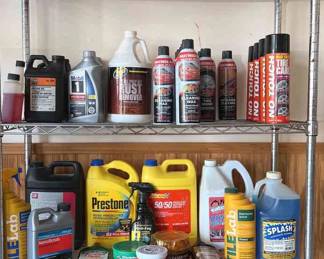 Metal Storage Rack With Fuels And Cleaning Supplies