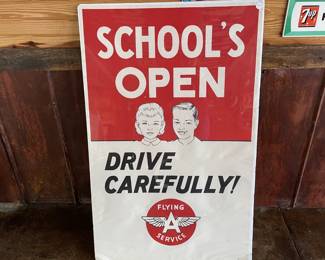 Flying A Schools Open Sign