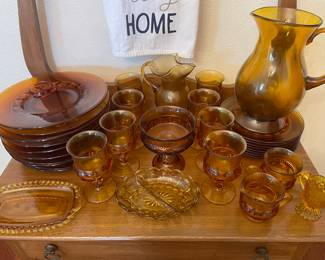 Antique amber thumbprint glassware. Service for 8
Also have the deviled egg tray. 