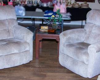 Upholstered matching reclining chairs