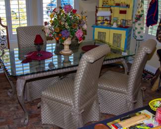 Glass top dining room table and chairs(x5)