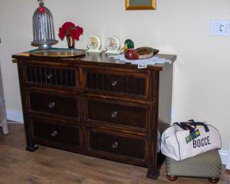 Elegant wooden dresser and decorations