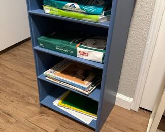 Four shelves plus top blue stand great for paper storage 