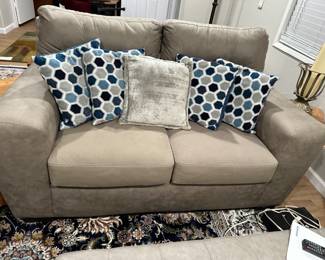 Loveseat matches sofa and ottoman 