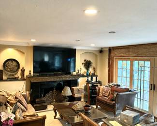 Coffee table $75
Side tables $30 each
Leather sofa and 2 loveseats $300
TV and audio equipment not for sale