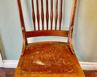 Antique wood chair with leather seat 
