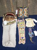 Plains Indian Beadwork
Cradle Board
Parfleche Bag
Gauntlets
Sioux Knife Sheath