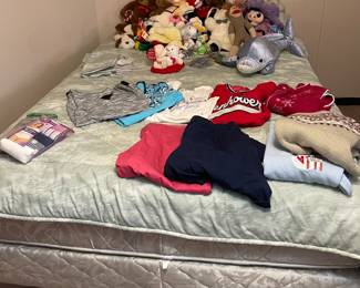 Queen frame, mattress. Misc stuffed animals, some clothing