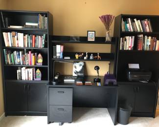 Newer Techline modular black office furniture , 5 years old. Being sold as a pair of Bookcases, a two piece desk, top and bottom and two separate file cabinets 