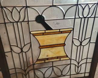 antique stained glass apothecary/pharmacy window from Joliet.
