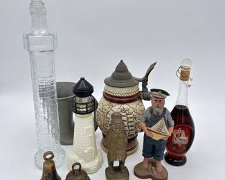 lighthouse and fisherman decor beer stein and brass fisherman statue