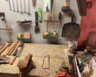 More hand tools, extension cord and ANTIQUE workbench.