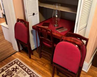 Vintage folding card table and 4 matching  chairs.