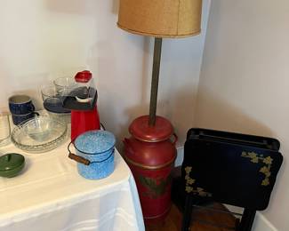 Enamelware, gumball dispenser, milk can floor lamp and TV tables.