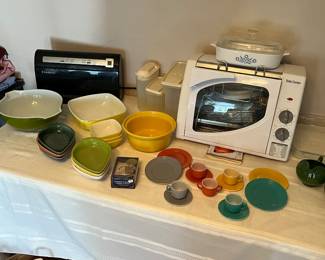 Rotisserie, food sealer, anchor hocking tea cups and saucers, Pyrex and corning ware.