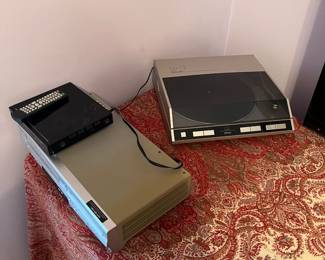 Denon Turn table and VHS DVD player.
