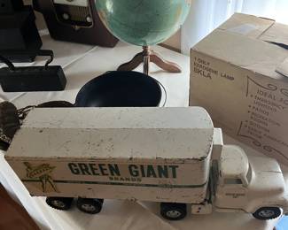 Vintage tin truck n trailer, globe and vintage oil lamp never removed from box.