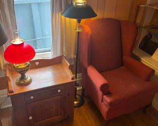 Antique floor lamp with glass shade, antique table lamp with glass shade, queen anne chair and washstand. 