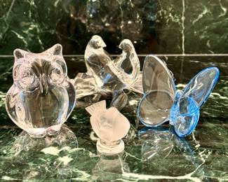 ALL SOLD; Daum crystal owl; 3x3.5.   $230; Baccarat crystal love birds; 4x3.   $68; Lalique frosted crystal bird; 1.5x1.75.    $180; Baccarat blue crystal Lucky Butterfly; 3.5x2.75.