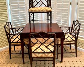 SOLD; beautiful game table with gold detailing and a drawer on each side for each player, with four Chippendale arm chairs with custom upholstery; table: 37x37x30; chair: 24x19x36