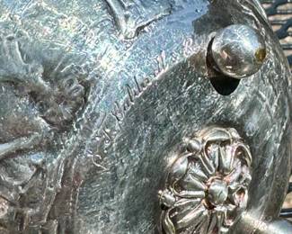 $350; silver plated bowl by EF Caldwell & Co from New York; detail of bottom of bowl; 4.25x2.5