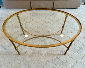 SOLD; gold gilded metal and glass oval coffee table; 40x28x19