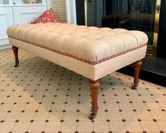 SOLD; custom-upholstered and piped tufted bench on casters by Charles Stewart Co; 53x24x19