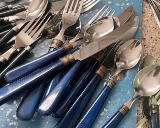 lots of small set of flatware 