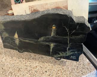  have artist info on this serene scene on this painted stone 