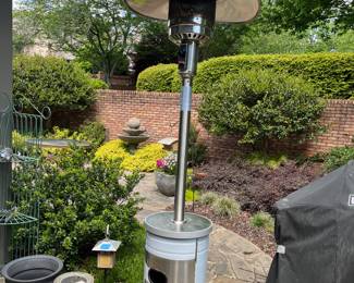 Nice outdoor heater with propane tank and storage cover