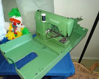 Vintage Elnar sewing machine in metal case