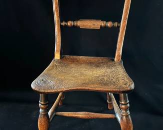Antique child's chair in Empire style