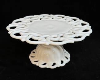 Antique Milk Glass Cake Stand With A Decorative Pierced Lace Edge And Base