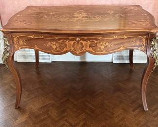 Fine French Table/desk fronted with a single full-width drawer that has been elaborately inlaid 