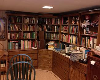 Lower level of house book shelves and more vintage books 