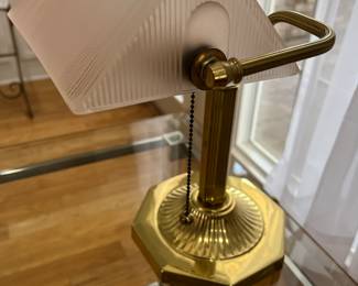 Brass banker's lamp with pink glass shade