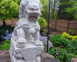 One of two white cement Foo Dog sculptures (22"H x 14"D x 9"W)
