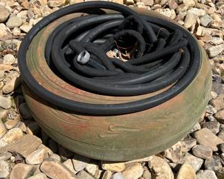 Clay pot (with garden hose)